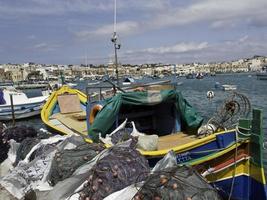 Marsaxlokk harbor on malta island photo