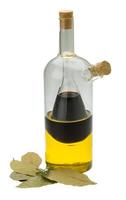 Vinegar, olive oil and laurel photo