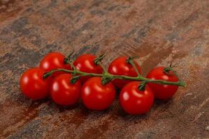 Ripe tomatoes on the branch photo