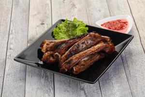 Roasted pork ribs photo