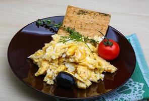 Scrambled eggs with tomato photo