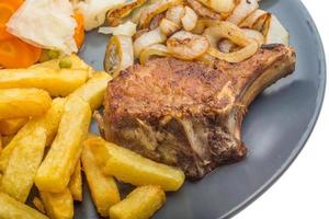 T-bone steak on white background photo