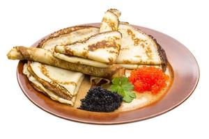 Russian pancakes on white photo