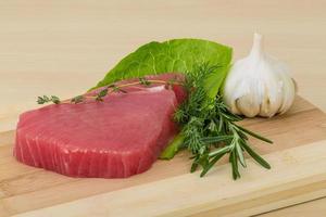 Raw tuna steak photo