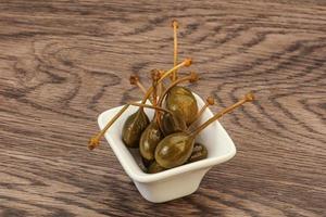 Caper berries in the bowl photo