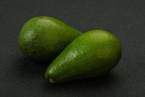 Two ripe exotic avocado vegetable photo