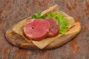 Raw tuna round steak for grill photo