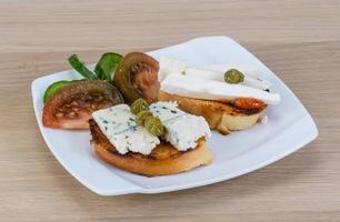 Tapas with soft cheese photo
