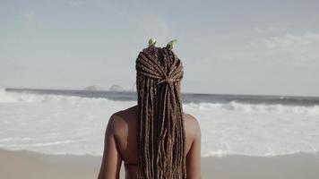 Latin young girl, famous beach Rio de Janeiro, Brazil. Latin summer vacation holiday. Cinematic 4K. video
