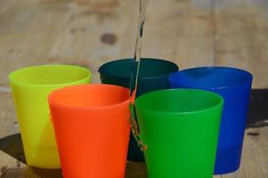 Colorful plastic cups photo