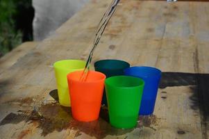 Colorful plastic cups photo