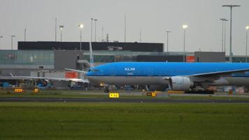 AMSTERDAM, THE NETHERLANDS JULY 27, 2017 - KLM Asia Boeing 777 PH BQH taxiing after landing. Shiphol Airport, Amsterdam, Holland video