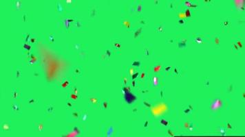 Realistic colorful ribbons falling on green background. video