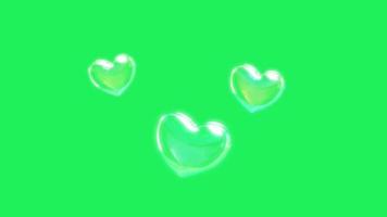 animation vita bubblor flyter på grön bakgrund. video