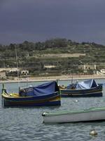 Marsaxlokk harbor on malta island photo