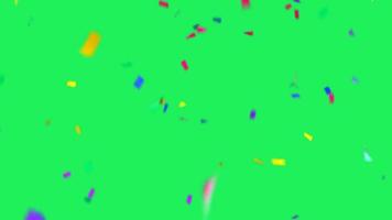 realistische kleurrijke linten die op groene achtergrond vallen. video