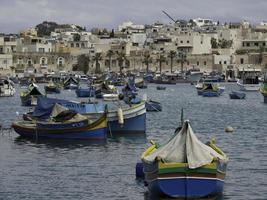 Marsaxlokk harbor on malta island photo