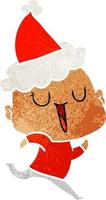 happy retro cartoon of a bald man wearing santa hat vector