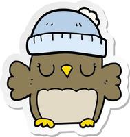 sticker of a cute cartoon owl in hat vector