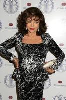 LOS ANGELES, APR 22 -  Joan Collins at the Women s Guild Cedars-Sinai Luncheon at Beverly Hills Hotel on April 22, 2014 in Beverly Hills, CA photo