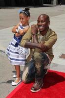 LOS ANGELES, JUN 23 -  Tyrese Gibson, daughter at the Fast and Furious, Supercharged Ride Press Event at the Universal Studios on June 23, 2015 in Universal City, CA photo