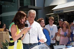 LOS ANGELES, AUG 23 -  Heather Tom, John McCook at the Bold and Beautiful Fan Meet and Greet at the Farmers Market on August 23, 2013 in Los Angeles, CA photo