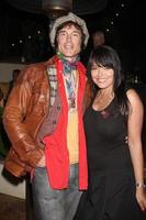 LOS ANGELES, DEC 11 -  Ronn Moss and Wife Devin at Heather Tom s Annual Christmas Party 2010 at Private Home on December 11, 2010 in Glendale, CA photo