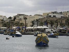 Marsaxlokk harbor on malta island photo