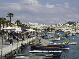 Marsaxlokk harbor on malta island photo