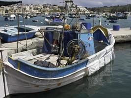 Marsaxlokk harbor on malta island photo