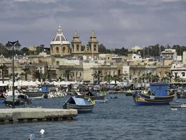 Marsaxlokk harbor on malta island photo