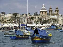 Marsaxlokk harbor on malta island photo