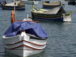 Marsaxlokk harbor on malta island photo