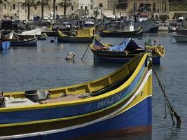 Marsaxlokk harbor on malta island photo