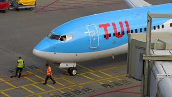 AMSTERDAM, THE NETHERLANDS JULY 29, 2017 - TUI Fly Boeing 737 PH TFF parked after arrival. Shiphol Airport, Amsterdam, Holland video