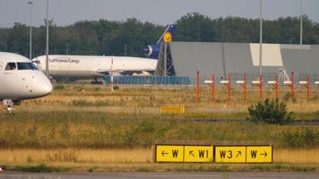 FRANKFURT AM MAIN, GERMANY JULY 18, 2017 - AirEuropa Embraer ERJ 195 EC LKX taxiing after landing. video