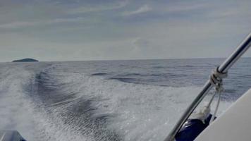 View from the rear of moving speedboat, slow motion, HDR footage video