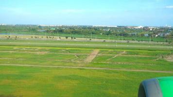 The aircraft descending before landing Suvarnabhumi airport, Thailand. Slow motion video