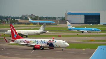 AMSTERDAM, THE NETHERLANDS JULY 29, 2017 - Corendon Dutch Airlines Boeing 737 PH CDF taxiing before departure, Vueling airbus a320 EC JZI, KLM Boeing 737 . Shiphol Airport, Amsterdam, Holland video