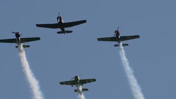 NOVOSIBIRSK, RUSSIAN FEDERATION JULY 28, 2019 - Sport trainer aircrafts performance group aerobatic flight. Airshow at the Mochische aerodrome -UNNM- video