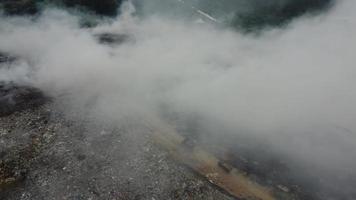 Aerial view truck in the burning of landfill site video