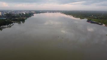 Aerial view small boat move at river video