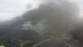 Aerial view black smoke pollution due to fire burning video