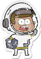 distressed sticker of a cartoon surprised astronaut holding moon rock vector