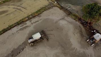Aerial view tractors plow video