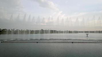 Panning of fountain in evening video