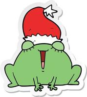 sticker of a cute cartoon christmas frog vector