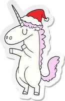 sticker cartoon of a unicorn wearing santa hat vector