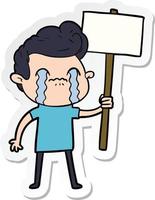 sticker of a cartoon man crying holding sign