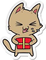 pegatina de un gato silbante de dibujos animados con regalo de navidad vector